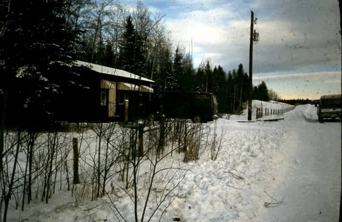 Brown walled building along country road